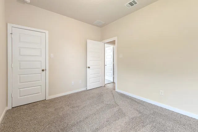an empty room with closet
