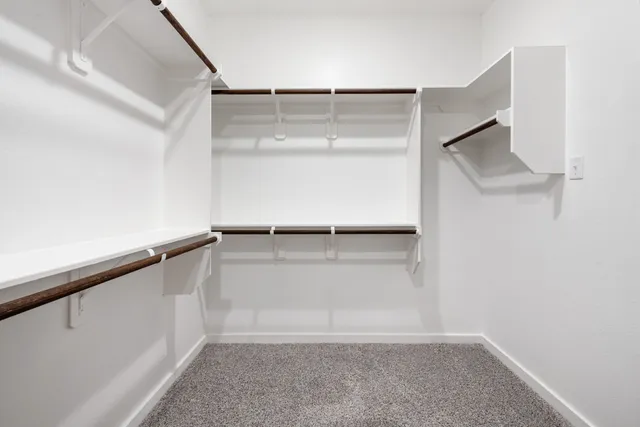 a view of an empty walk in closet