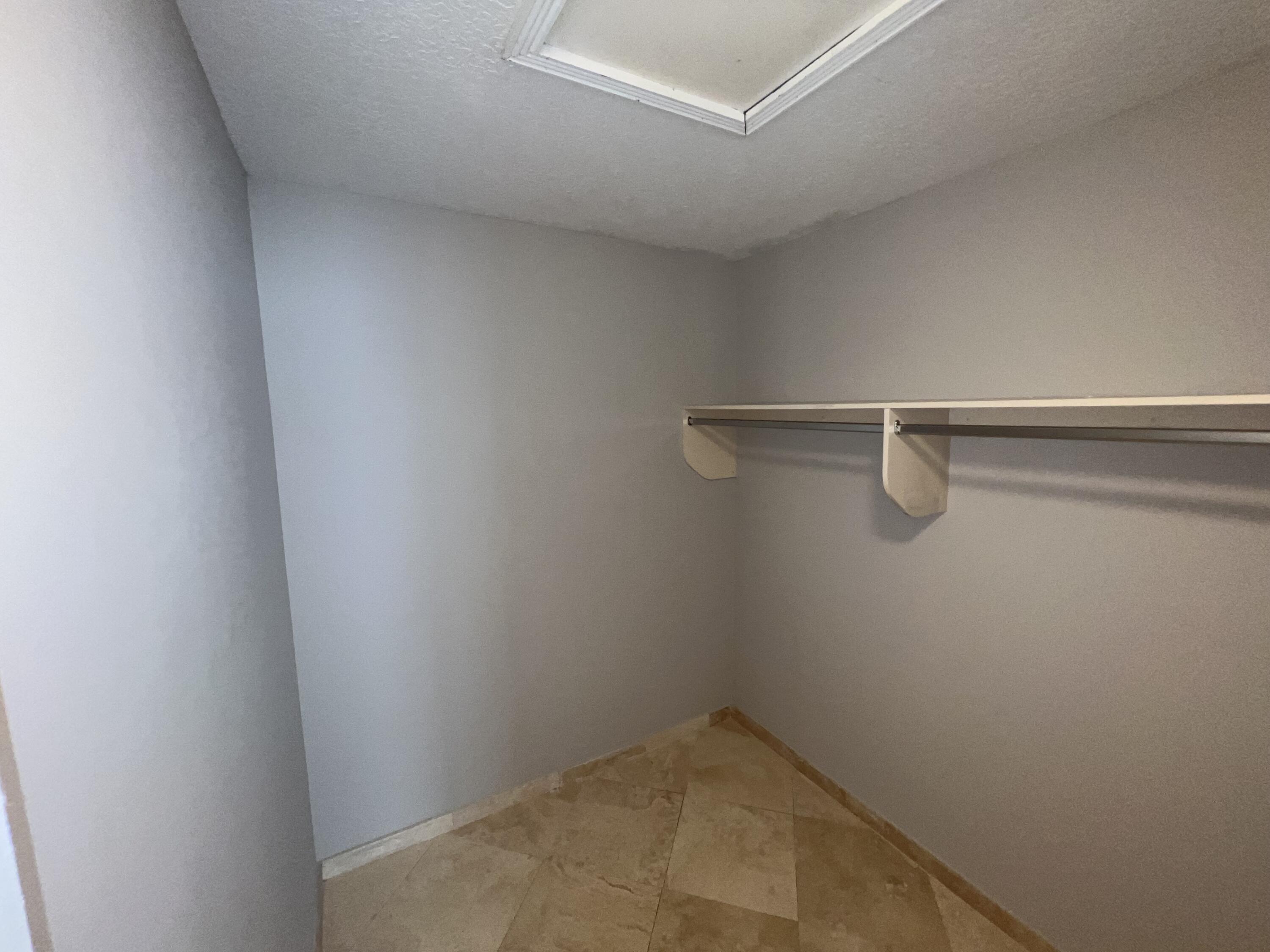 20077 Palm Island Drive Boca Raton, FL 33498 - Photo 15 of 47 a view of a room with racks on the wall