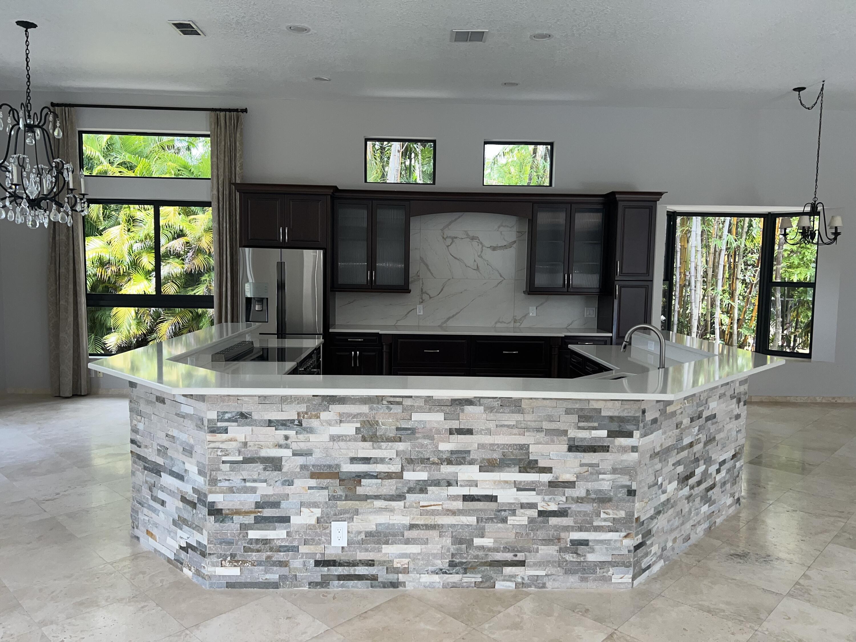 20077 Palm Island Drive Boca Raton, FL 33498 - Photo 20 of 47 a living room with fireplace furniture and a flat screen tv
