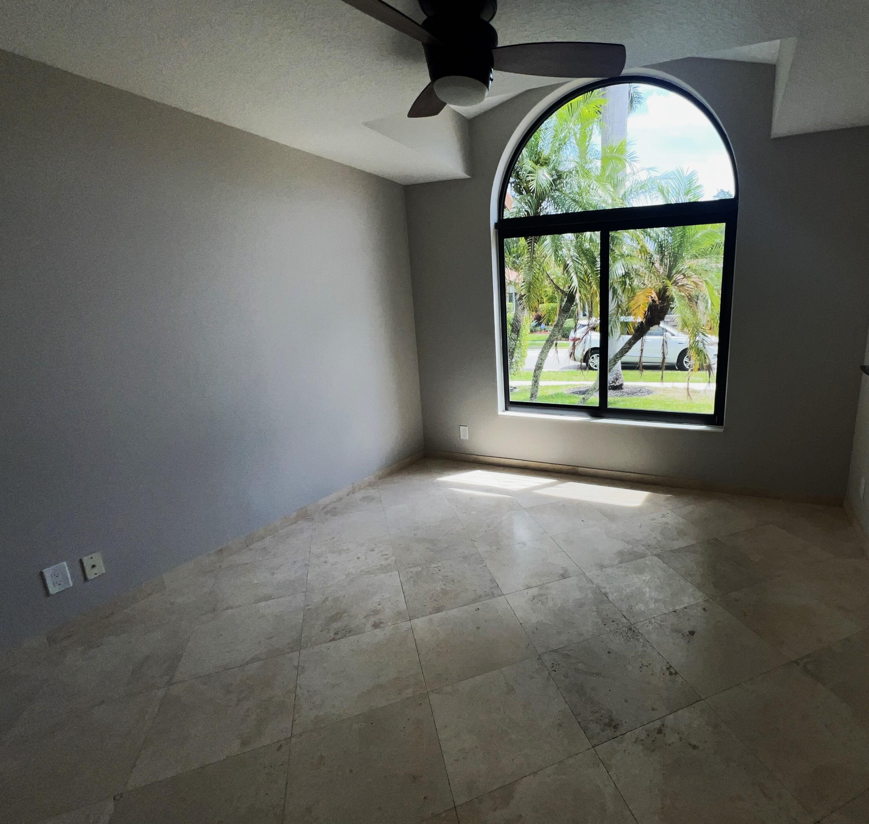 20077 Palm Island Drive Boca Raton, FL 33498 - Photo 33 of 47 an empty room with a large window