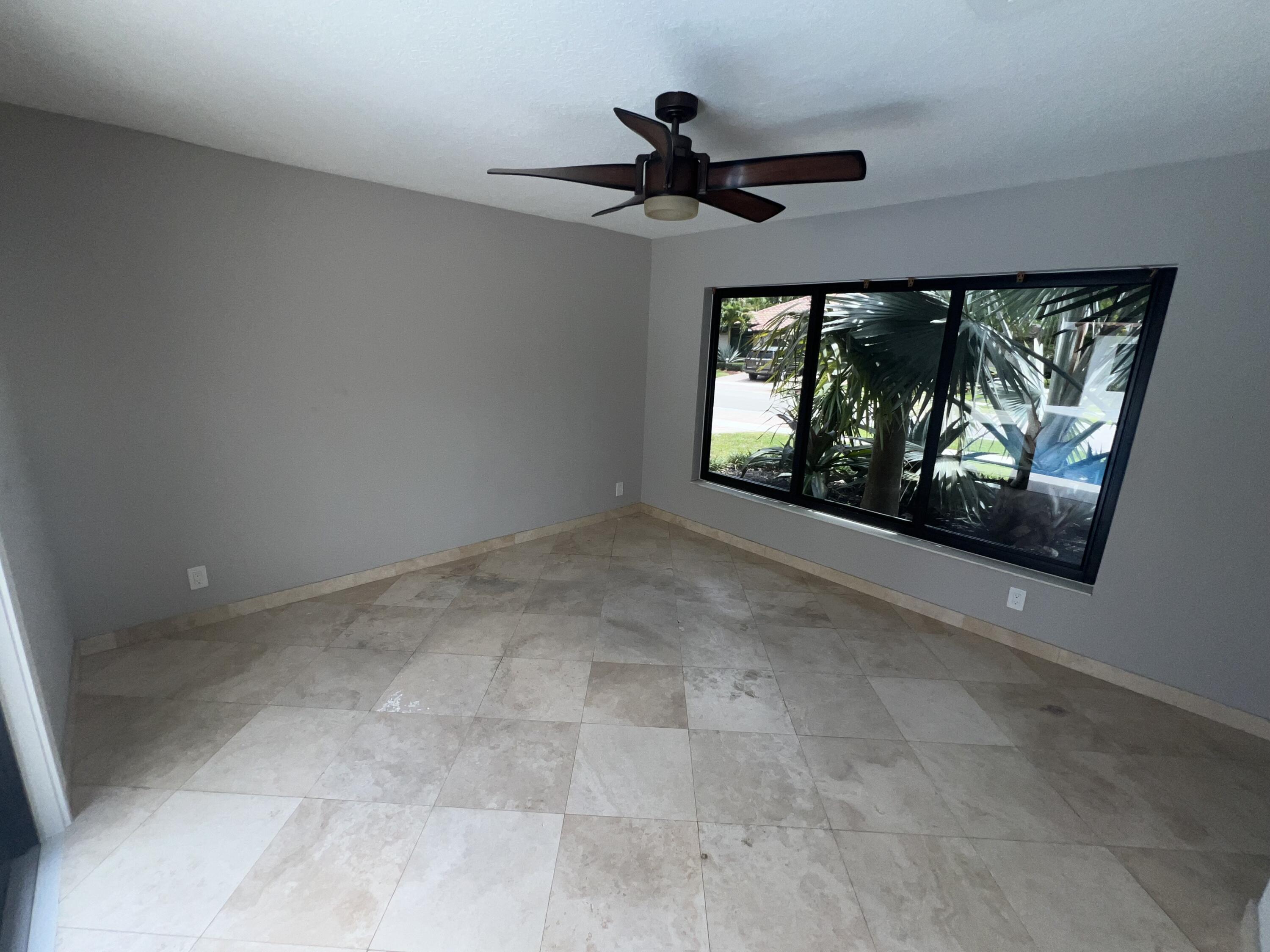 20077 Palm Island Drive Boca Raton, FL 33498 - Photo 35 of 47 a view of an empty room with a fireplace