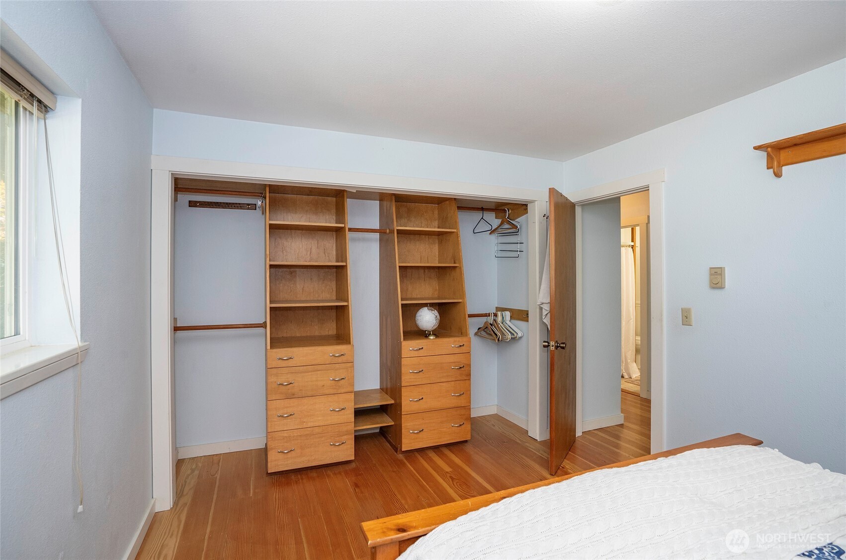 16412 50th St Court Southwest Longbranch, WA 98351 - Photo 13 of 35 a bedroom with a bed and a closet