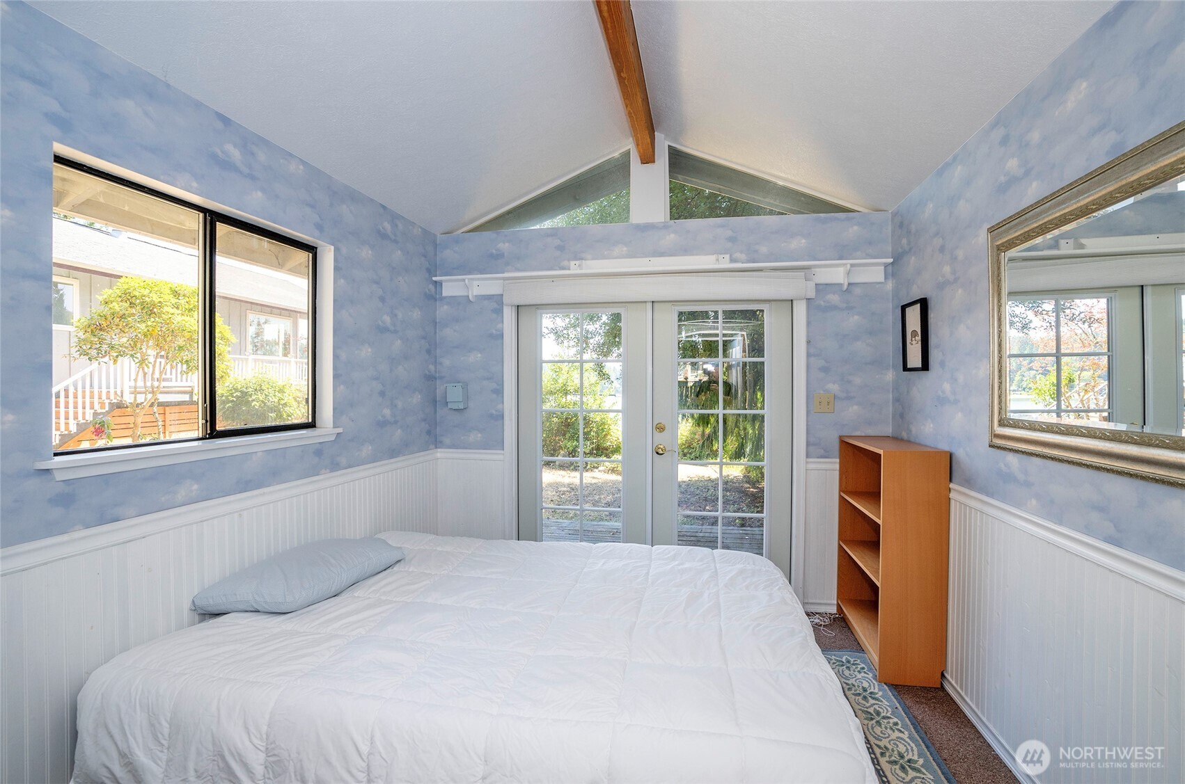 16412 50th St Court Southwest Longbranch, WA 98351 - Photo 18 of 35 a bedroom with a bed and a window