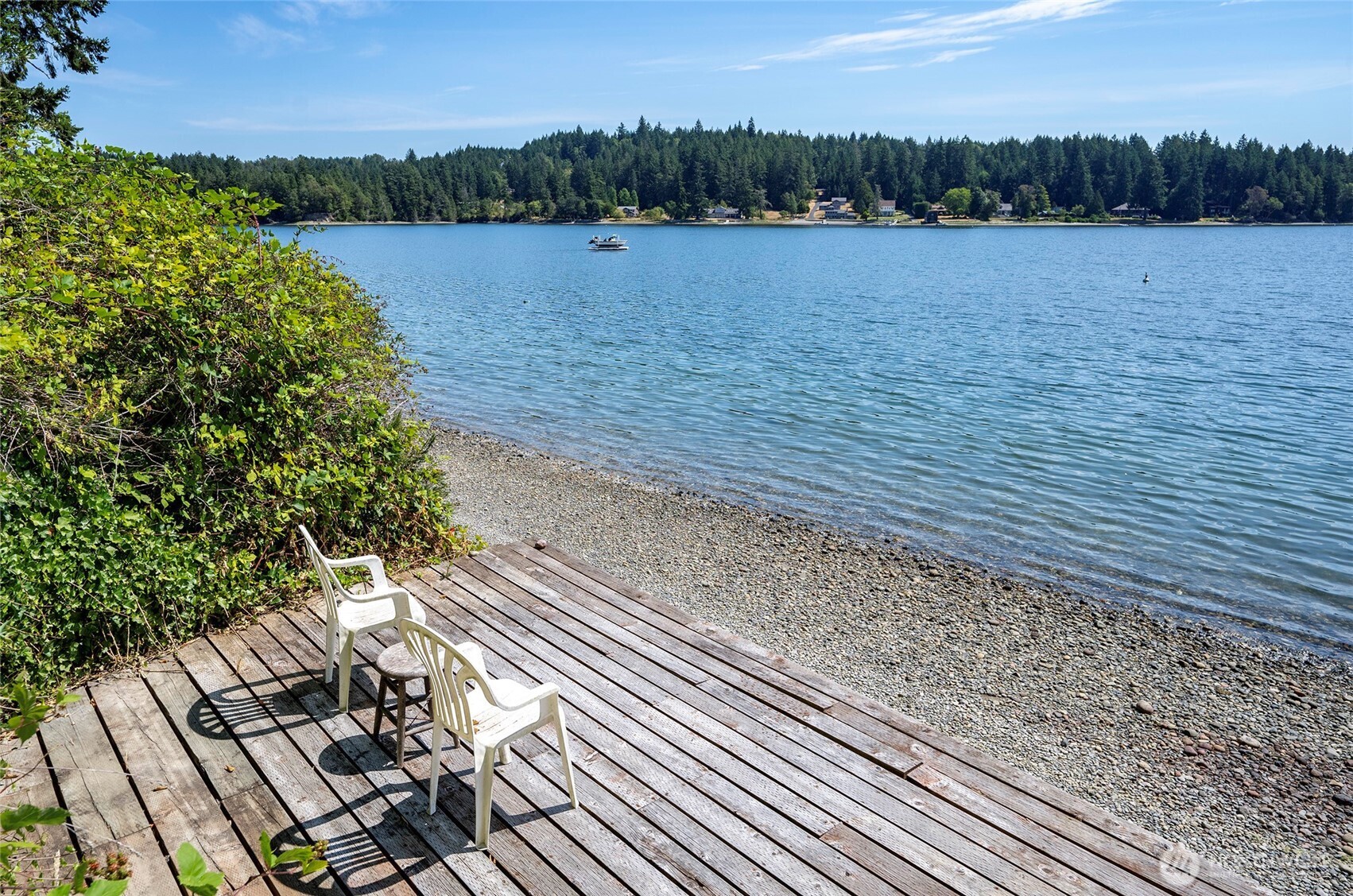 16412 50th St Court Southwest Longbranch, WA 98351 - Photo 28 of 35 a view of a lake with a mountain in the background