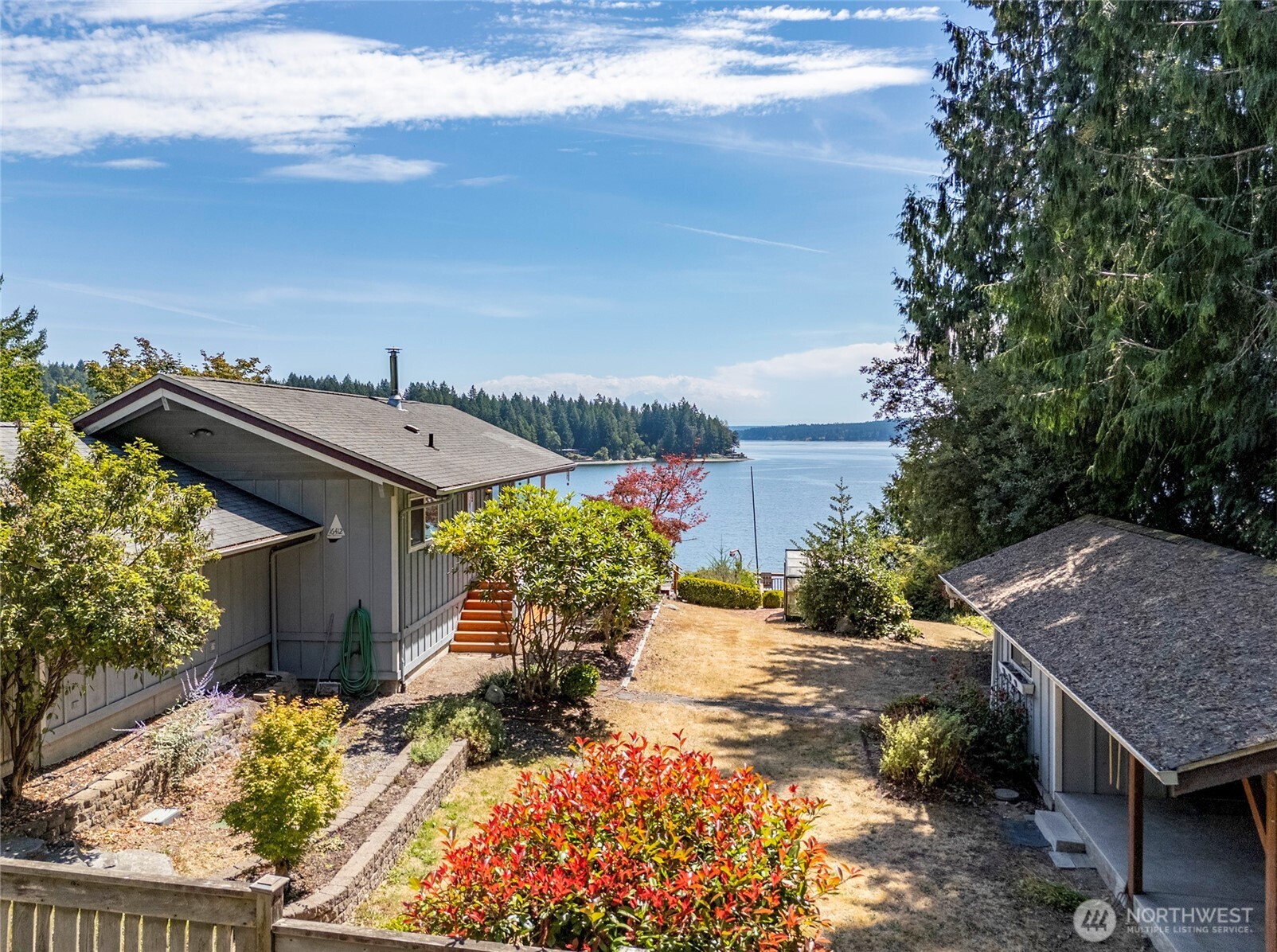16412 50th St Court Southwest Longbranch, WA 98351 - Photo 30 of 35 a view of house with yard and sitting area