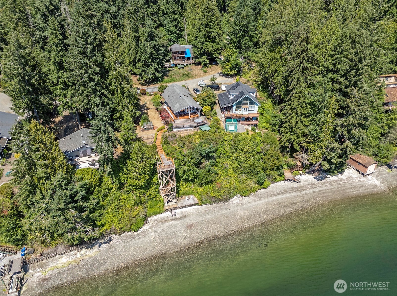 16412 50th St Court Southwest Longbranch, WA 98351 - Photo 35 of 35 a view of a garden with a house