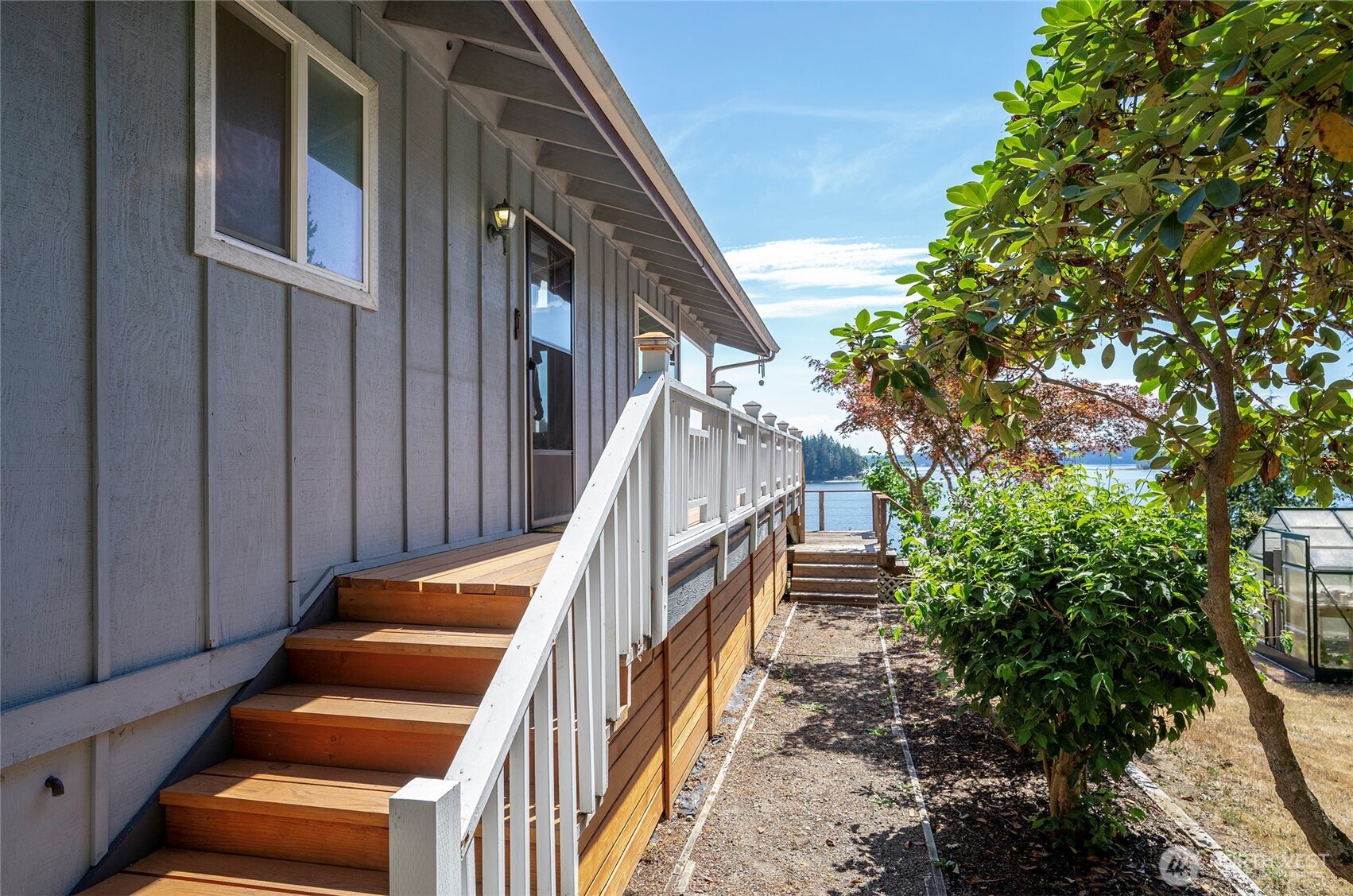 16412 50th St Court Southwest Longbranch, WA 98351 - Photo 4 of 35 a view of outdoor space and deck