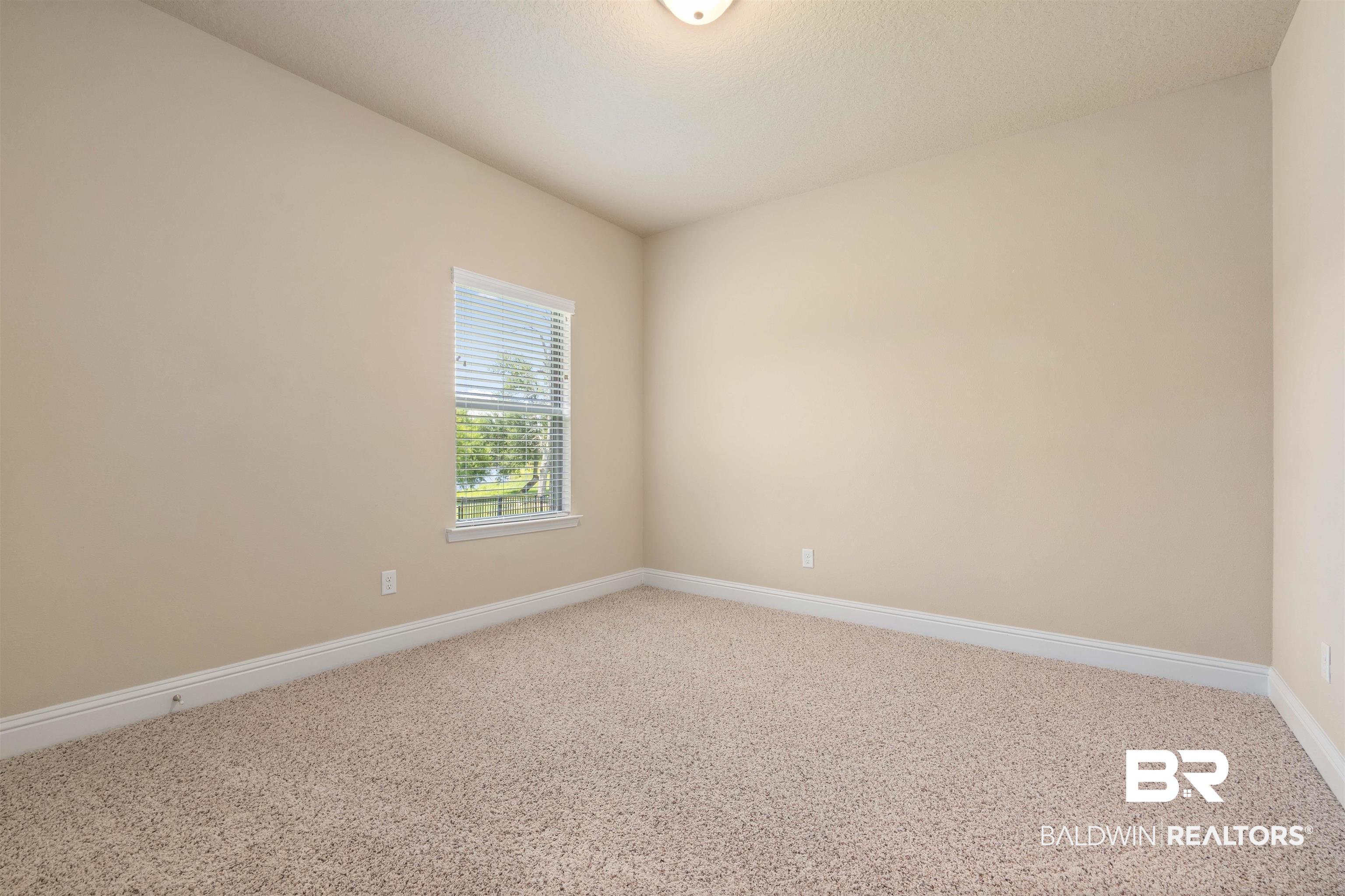 1864 Gwin Court Mobile, AL 36695 - Photo 28 of 37 Unfurnished room featuring carpet flooring