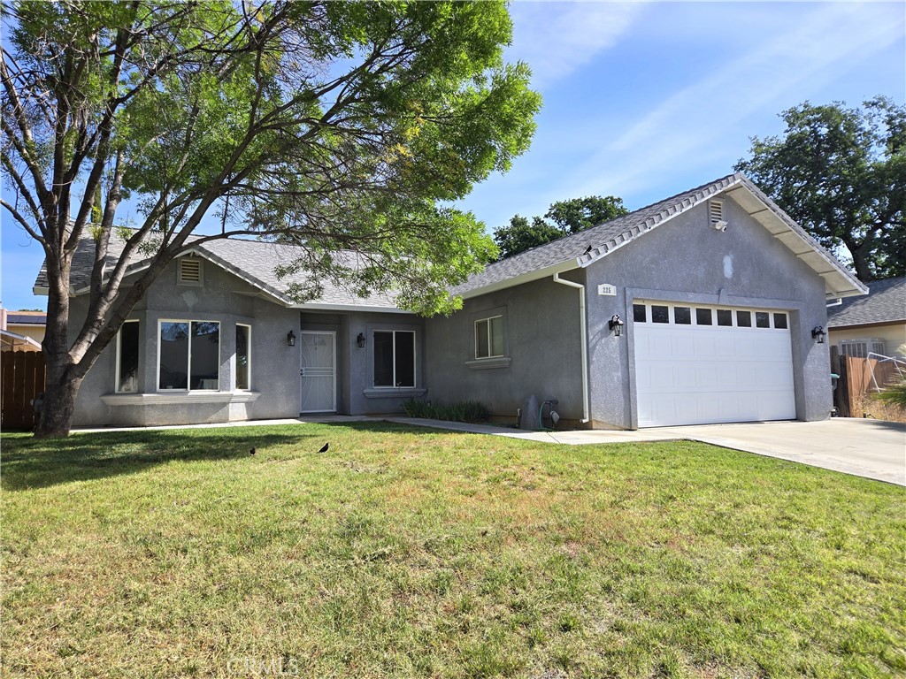 225 Sparrow Court Red Bluff, CA 96080 - Photo 1 of 29 a house that has a big yard with large trees