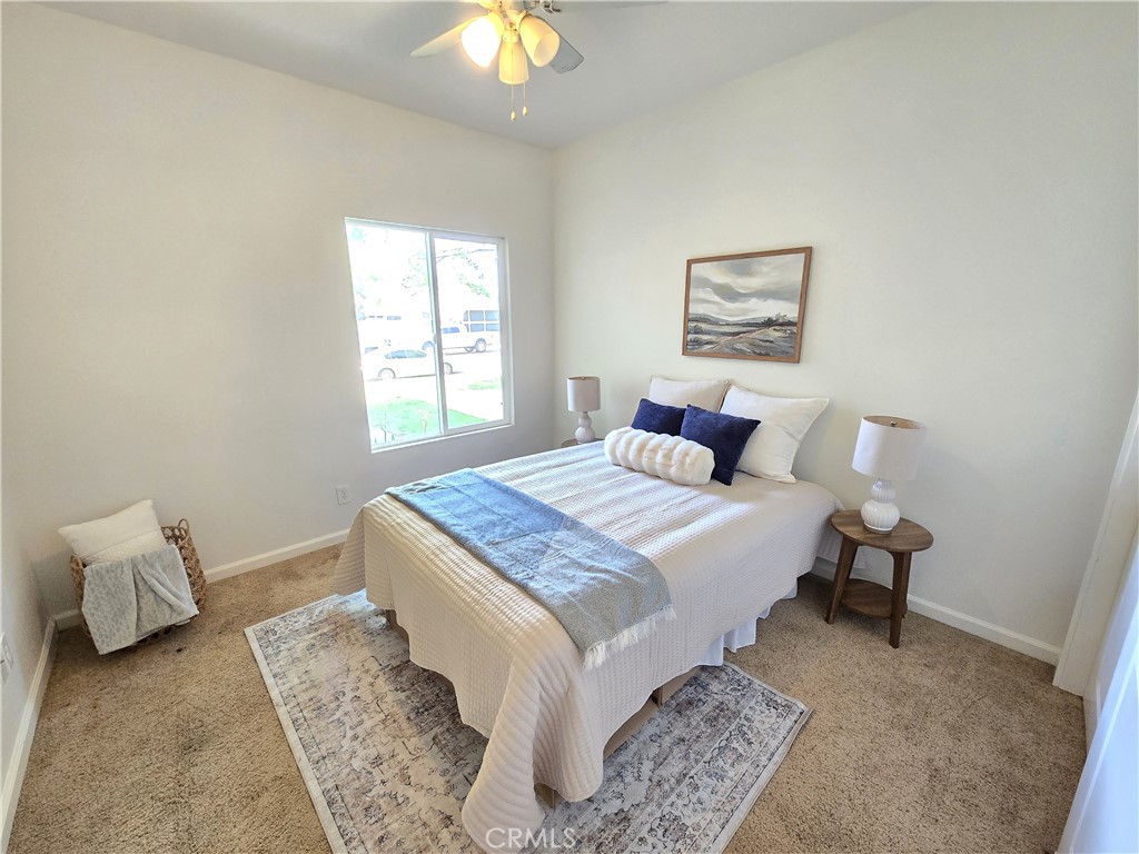 225 Sparrow Court Red Bluff, CA 96080 - Photo 12 of 29 a bedroom with bed and window