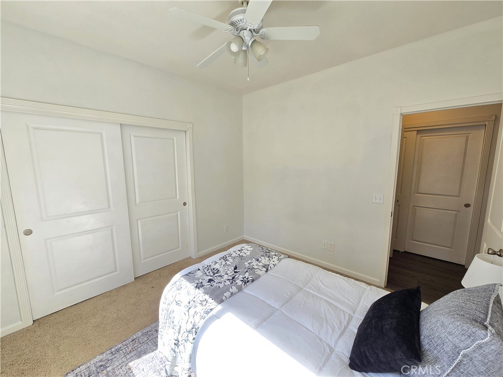 225 Sparrow Court Red Bluff, CA 96080 - Photo 21 of 29 a bedroom with a bed and cabinets