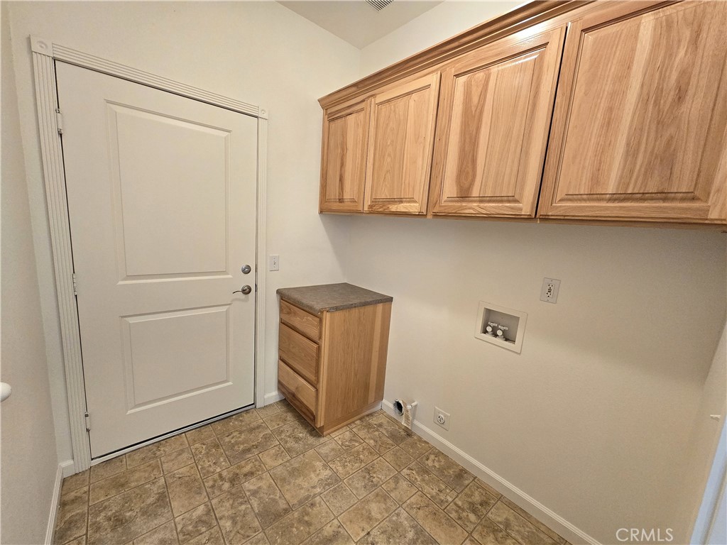 225 Sparrow Court Red Bluff, CA 96080 - Photo 22 of 29 a view of room with cabinet