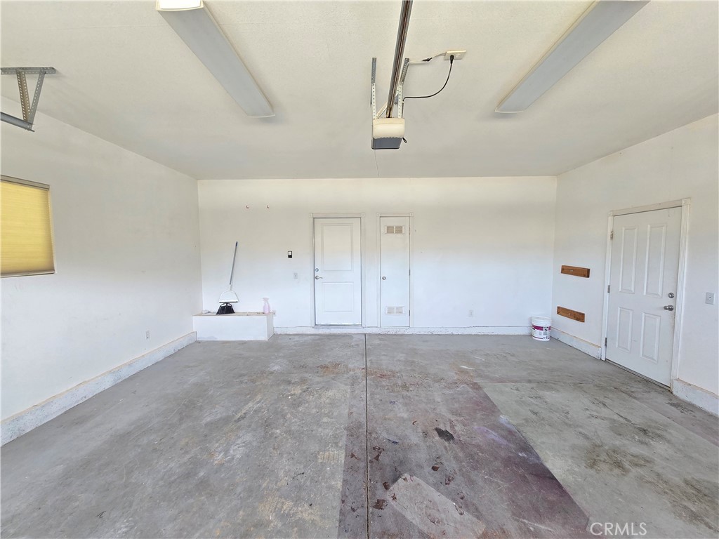 225 Sparrow Court Red Bluff, CA 96080 - Photo 24 of 29 a view of a room with window and ceiling fan