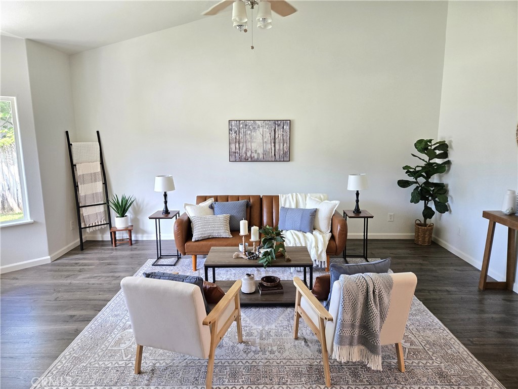 225 Sparrow Court Red Bluff, CA 96080 - Photo 3 of 29 a living room with furniture and wooden floor
