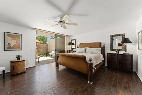 a bed room with a bed and a couch