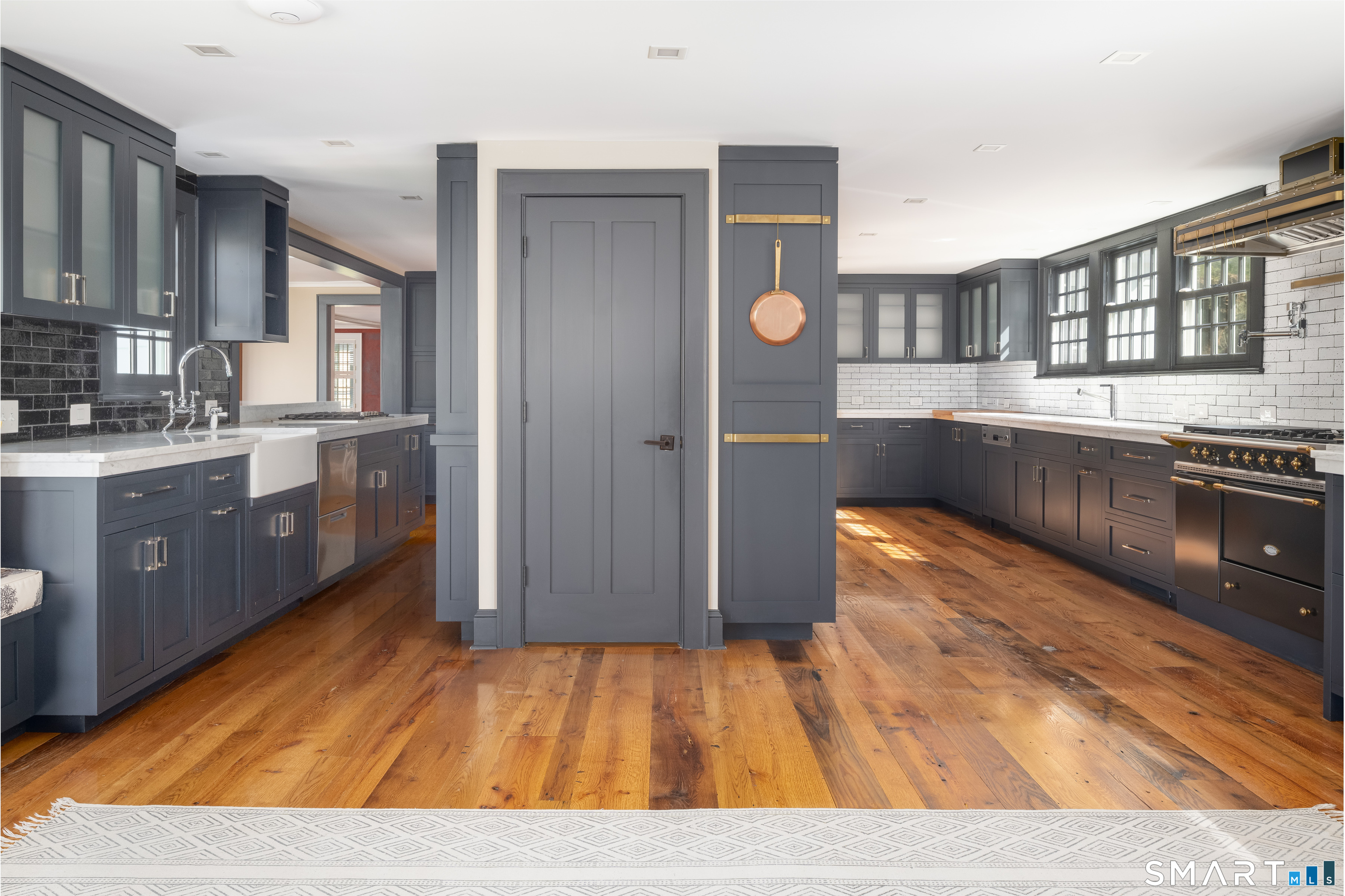 155 Long Ridge Road Danbury, CT 06810 - Photo 17 of 40 The kitchen itself is generous in scale and designed to function as a true working center of the home.