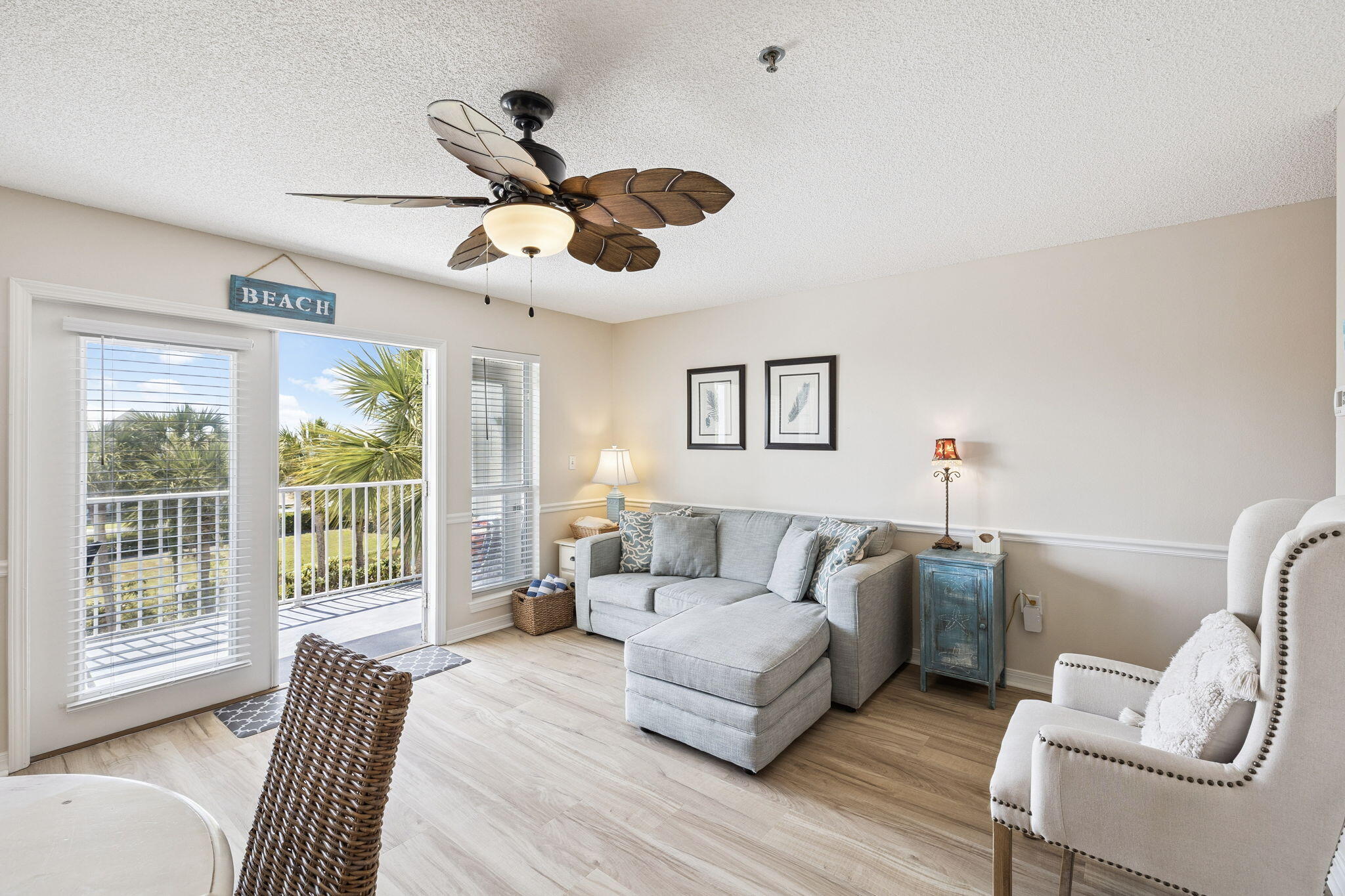 144 Spires Lane, Unit 310 Santa Rosa Beach, FL 32459 - Photo 11 of 41 a living room with furniture and a large window