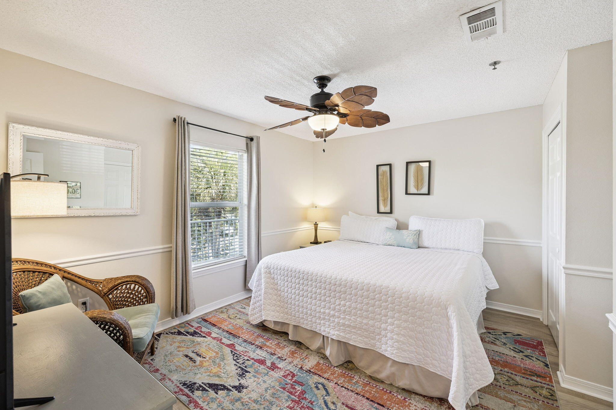 144 Spires Lane, Unit 310 Santa Rosa Beach, FL 32459 - Photo 19 of 41 a bedroom with a bed and a window