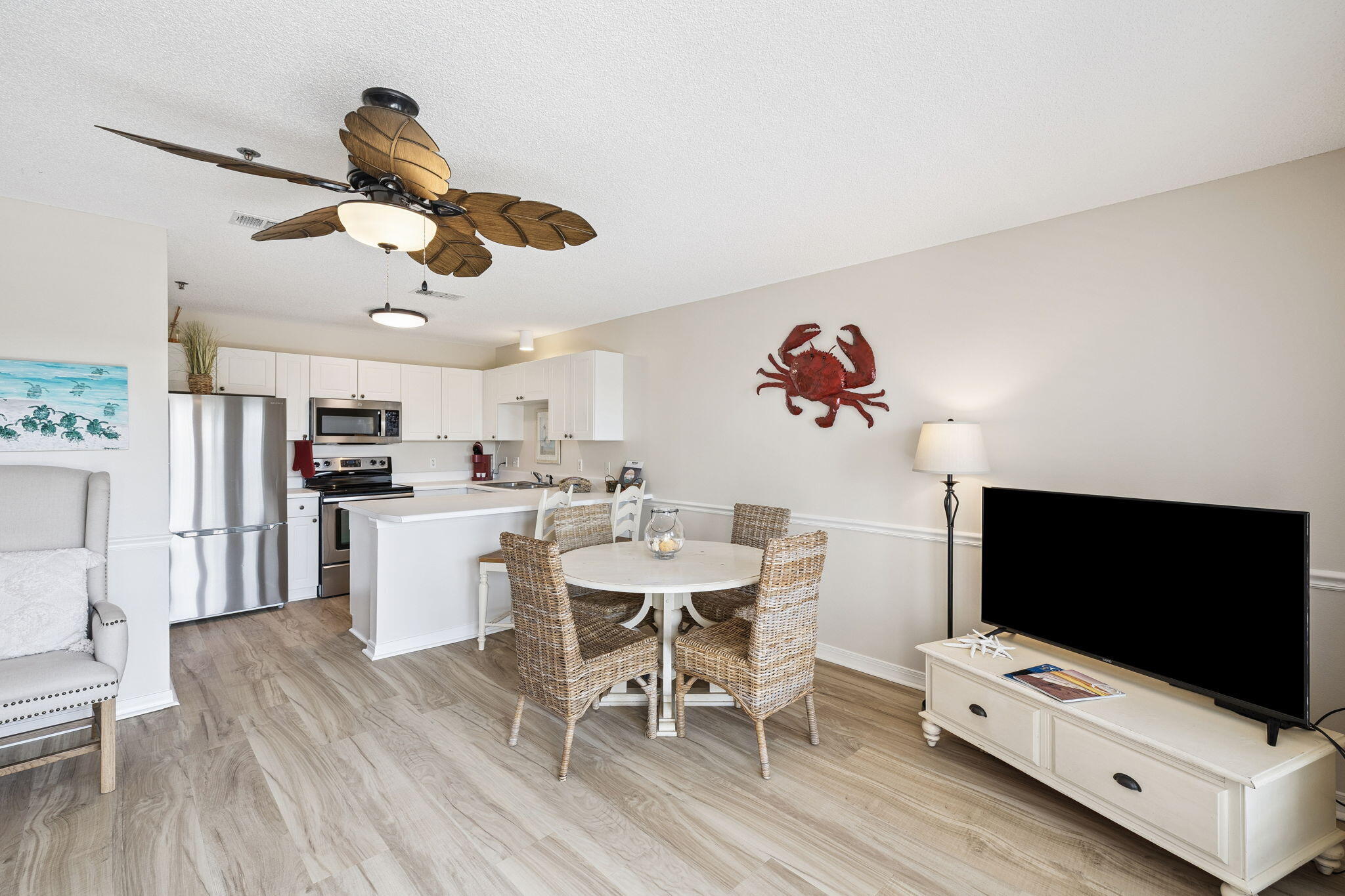 144 Spires Lane, Unit 310 Santa Rosa Beach, FL 32459 - Photo 7 of 41 a living room with furniture and a flat screen tv