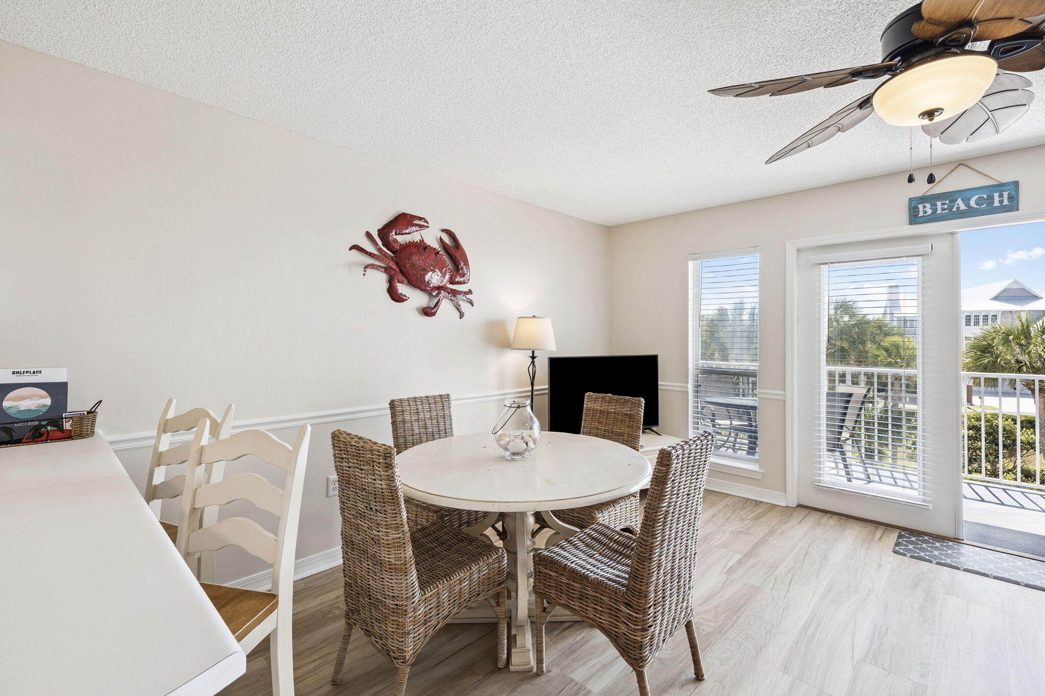 144 Spires Lane, Unit 310 Santa Rosa Beach, FL 32459 - Photo 8 of 41 a dining room with furniture and window