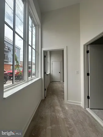 a room with furniture and a book shelf