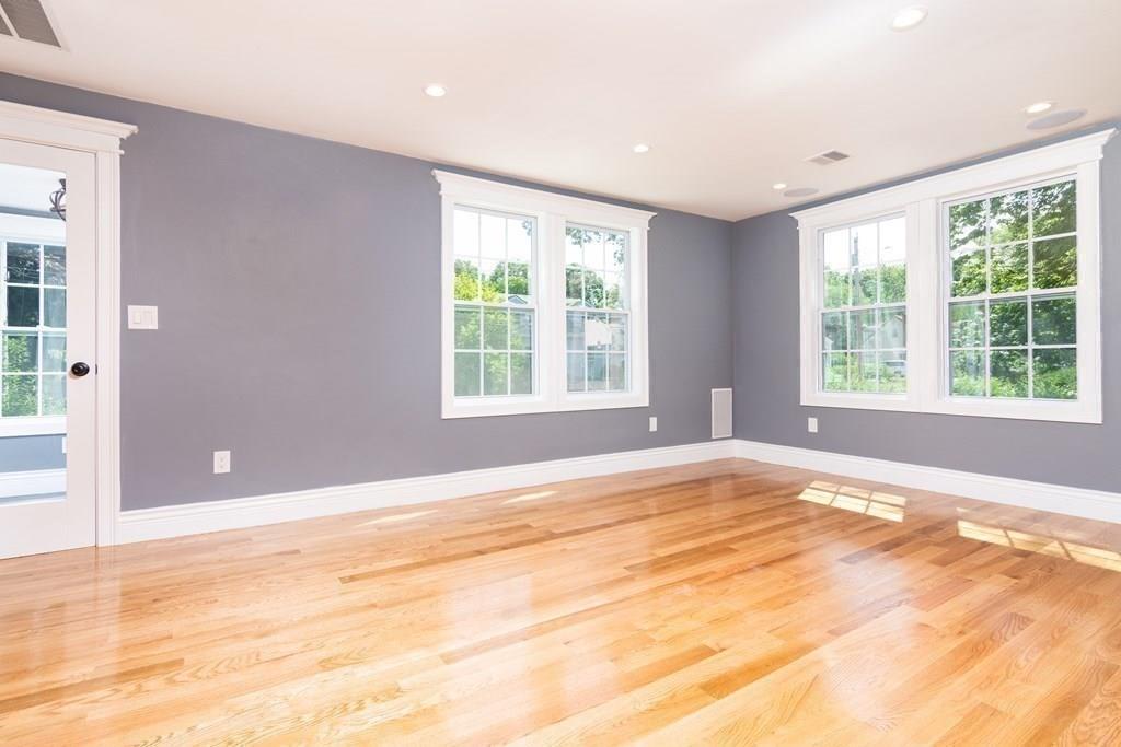 23 Amelian Road Randolph, MA 02368 - Photo 15 of 39 a view of an empty room with a window