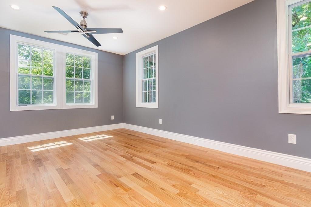 23 Amelian Road Randolph, MA 02368 - Photo 20 of 39 a view of an empty room with a window