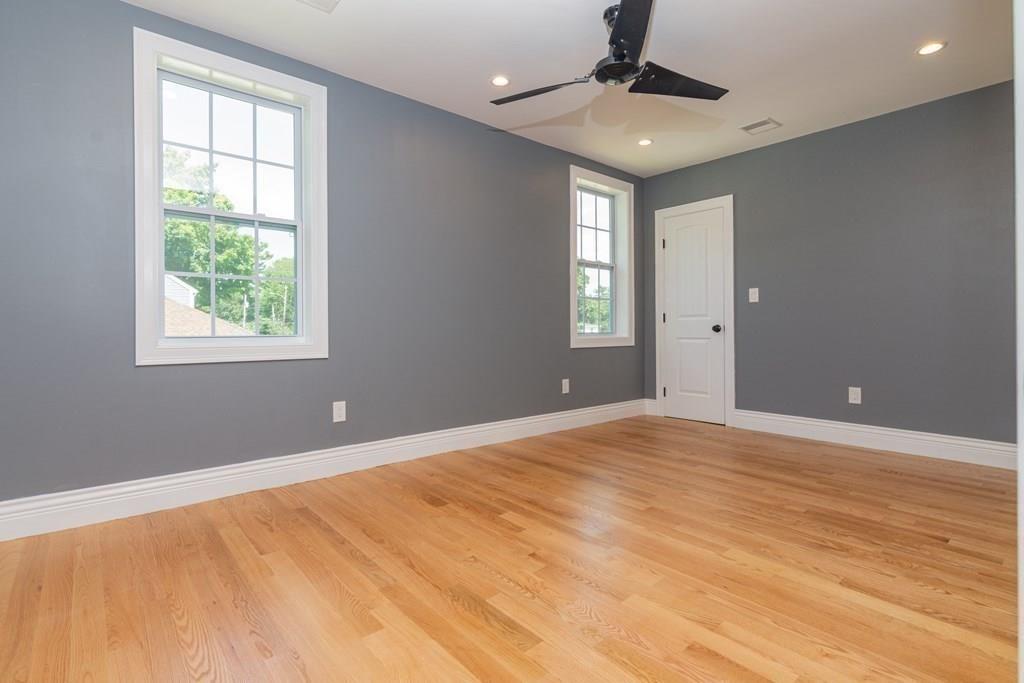 23 Amelian Road Randolph, MA 02368 - Photo 24 of 39 a view of an empty room with a window