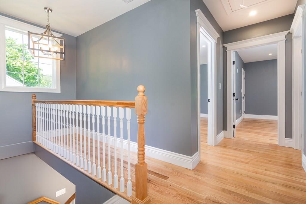 23 Amelian Road Randolph, MA 02368 - Photo 28 of 39 a view of a room with wooden floor and windows