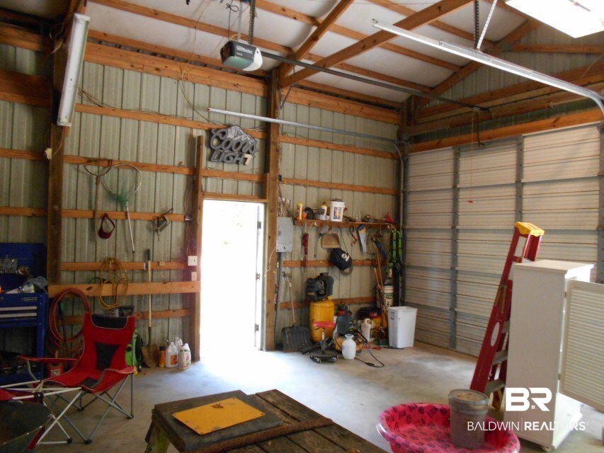 13408 Pendix Road Summerdale, AL 36580 - Photo 27 of 31 View of walk-in door and roll-up door.