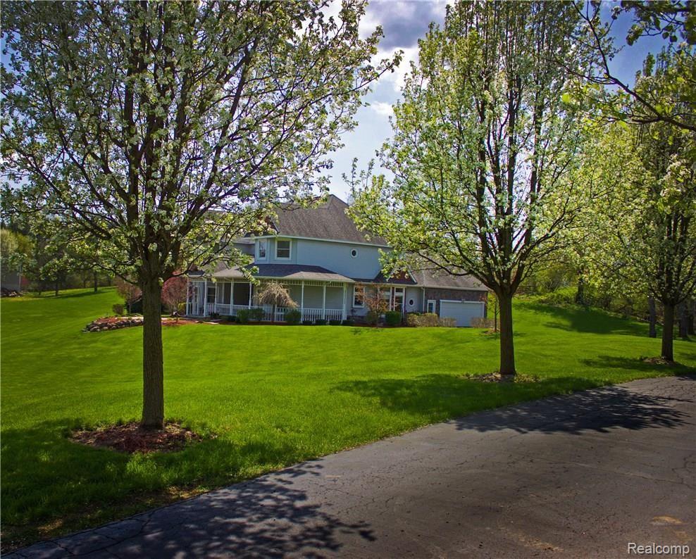 8096 Chilson Road Pinckney, MI 48169 - Photo 6 of 46 Newly Refinished Asphalt Driveway!
