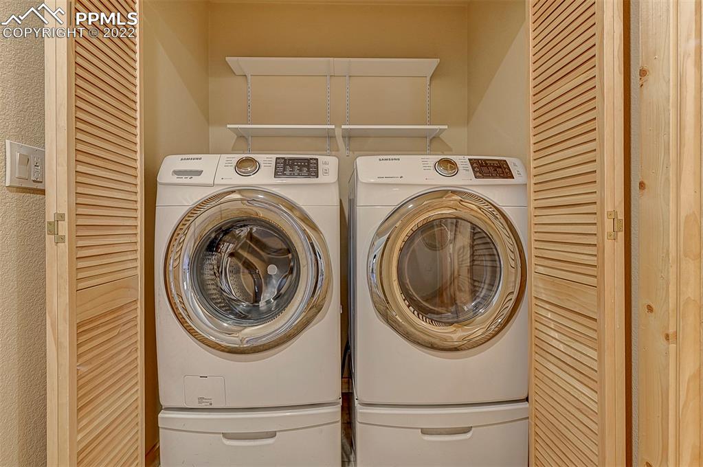 897 Fossil Creek Road Florissant, CO 80816 - Photo 11 of 40 a utility room with dryer and washer