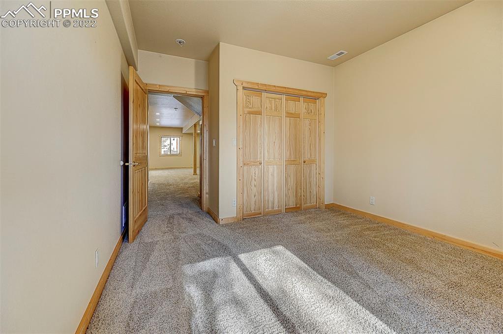 897 Fossil Creek Road Florissant, CO 80816 - Photo 15 of 40 a view of a room with an empty space