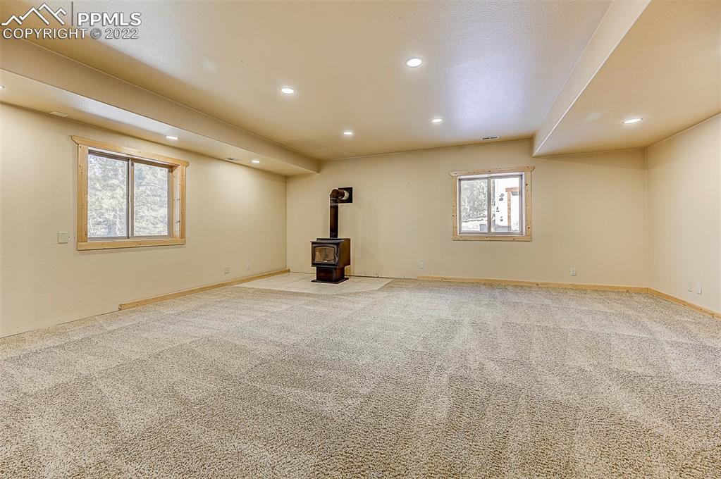 897 Fossil Creek Road Florissant, CO 80816 - Photo 20 of 40 a view of empty room with windows