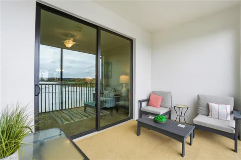 a living room with a couch and a table