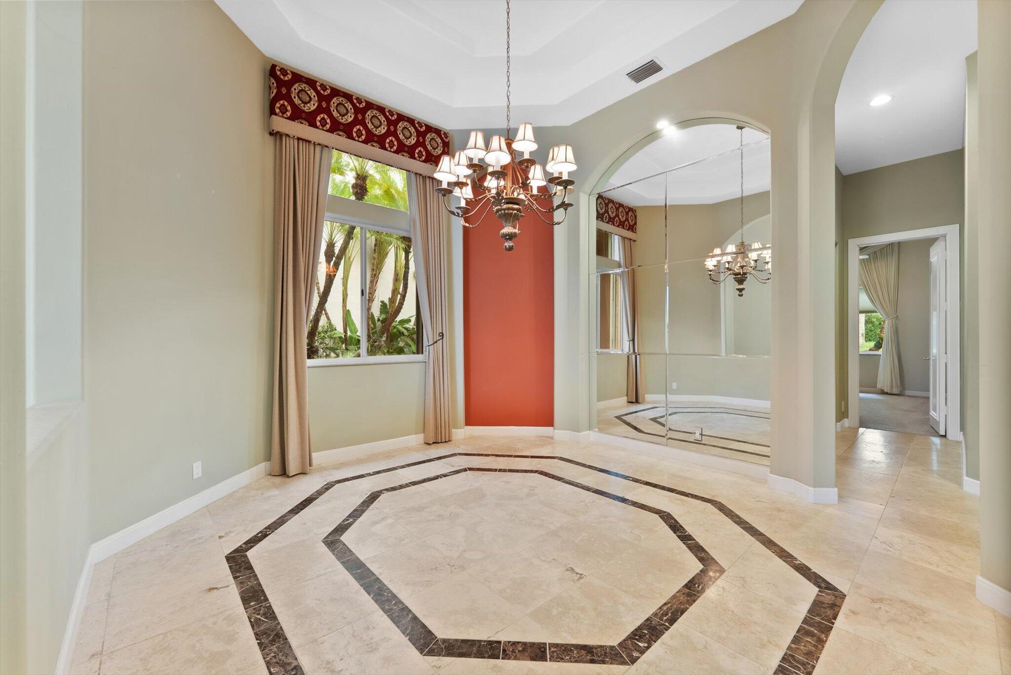 7081 Mallorca Crescent Boca Raton, FL 33433 - Photo 3 of 26 a view of a chandelier in a room