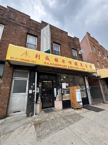 a view of a building with a garage