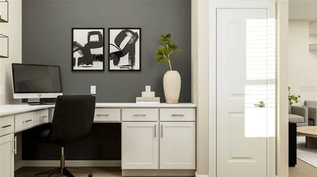 a view of cabinets a sink and a stove sitting inside of a kitchen