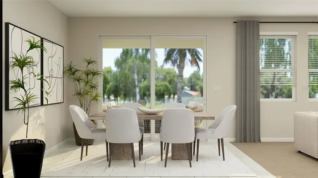 a dining room with furniture and window