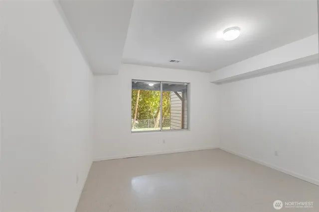 an empty room with a window