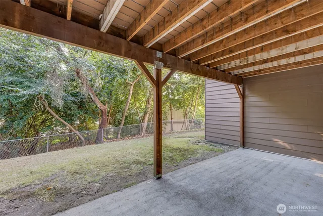 a view of backyard with green space
