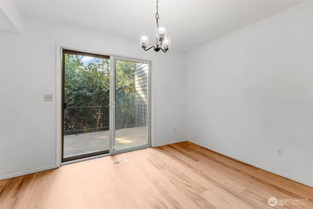 a view of a room with a large window