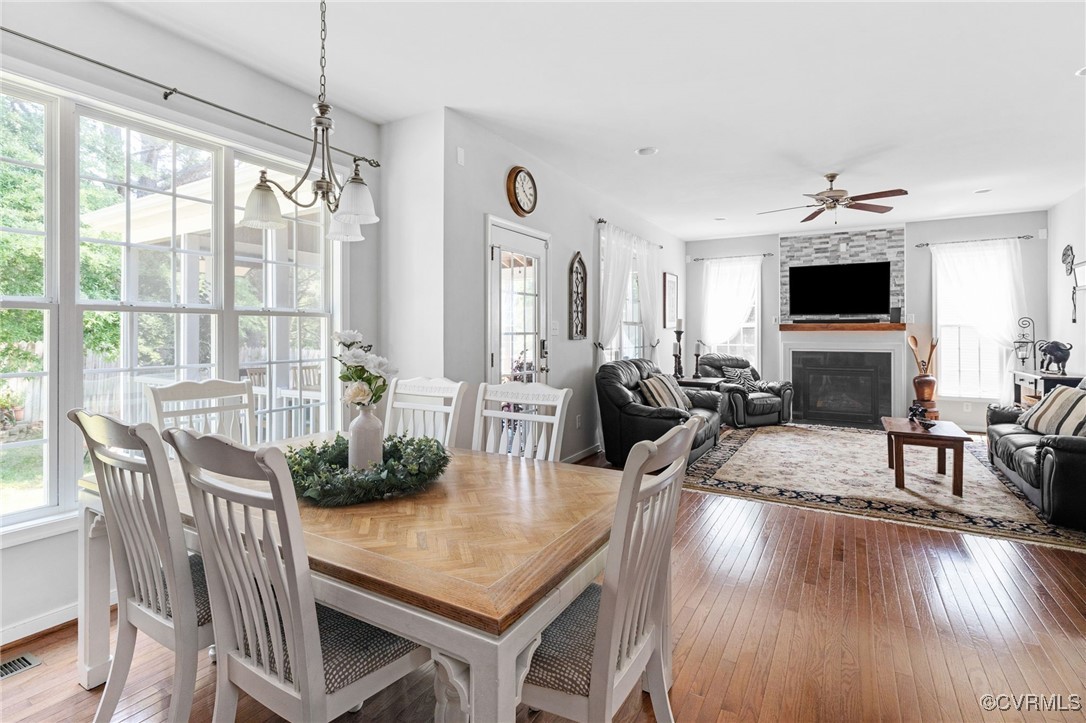 14300 Wallingham Loop Midlothian, VA 23114 - Photo 20 of 50 a view of a dining room with furniture window and wooden floor