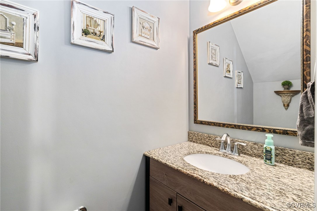 14300 Wallingham Loop Midlothian, VA 23114 - Photo 22 of 50 a bathroom with a granite countertop sink and a mirror