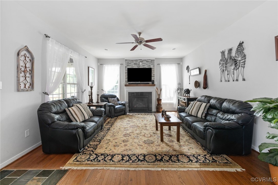 14300 Wallingham Loop Midlothian, VA 23114 - Photo 23 of 50 a living room with furniture fireplace and flat screen tv