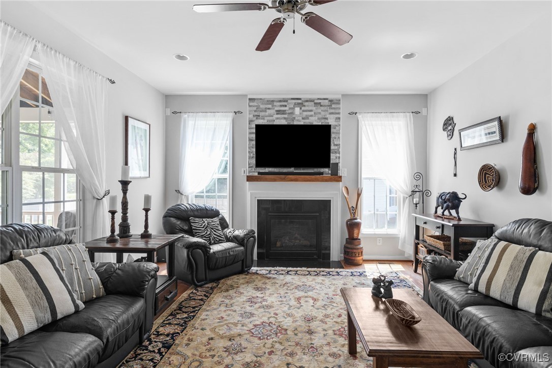 14300 Wallingham Loop Midlothian, VA 23114 - Photo 26 of 50 a living room with furniture fireplace and flat screen tv