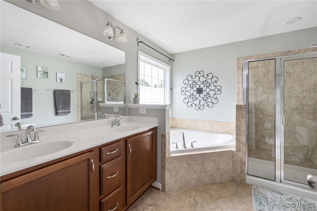 14300 Wallingham Loop Midlothian, VA 23114 - Photo 37 of 50 a spacious bathroom with a shower a sink and a bathtub