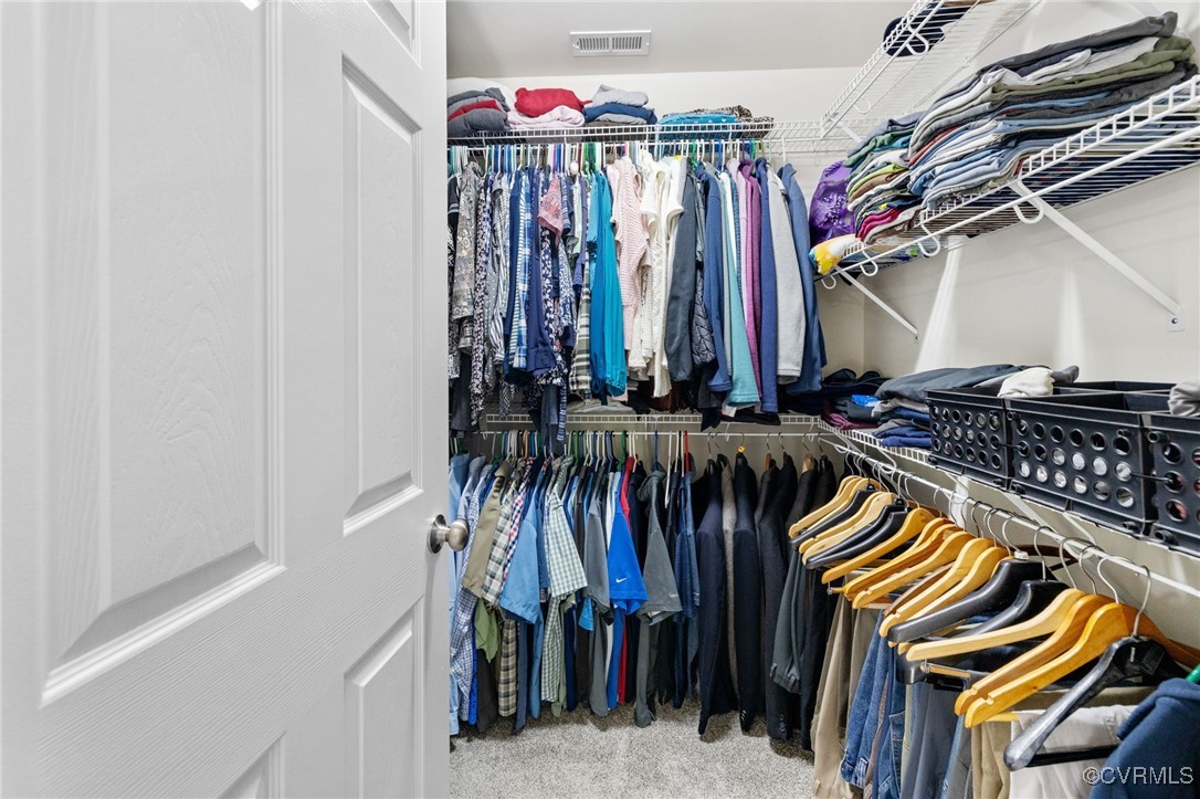 14300 Wallingham Loop Midlothian, VA 23114 - Photo 39 of 50 a view of walk in closet with clothes