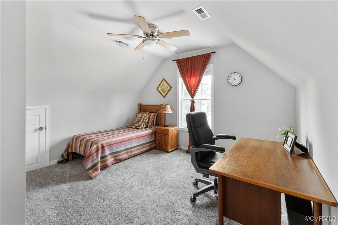 14300 Wallingham Loop Midlothian, VA 23114 - Photo 45 of 50 a bedroom with a bed and a chandelier